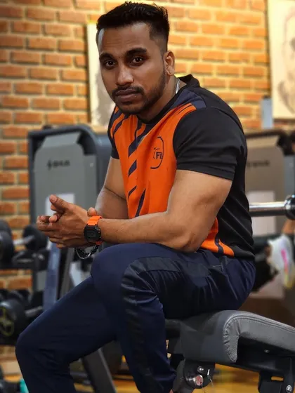 My expression shows my focus. I am always thinking about the next step in my fitness journey and how to help my clients with theirs.