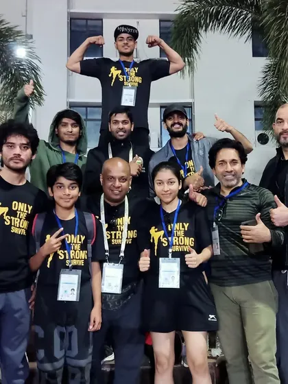 Teamwork wins championships. The full Dynamic Squad at the National Kickboxing Championship, where we won multiple medals and the "Most Disciplined Team" trophy.