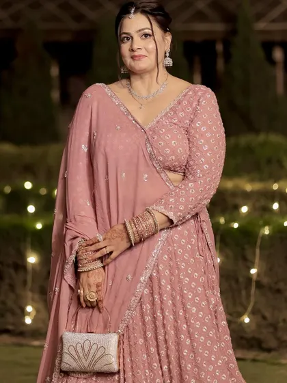 A full portrait showing her complete look with a matching clutch. She looks absolutely elegant and put-together.