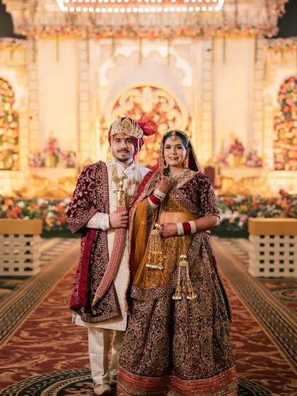 The happy couple, ready to start their new life together. Her bridal makeup is timeless, ensuring these photos will be cherished forever.