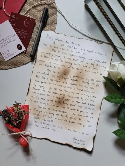 A complete Valentine's set: a handwritten letter, a mini bouquet, and a wax-sealed envelope. It’s everything you need to express your love.