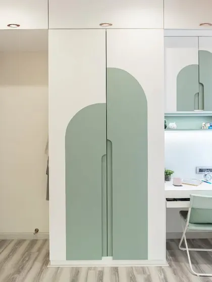 A full view of the custom wardrobe and integrated study unit. This design maximizes storage and functionality in a compact space, perfect for a child's room.