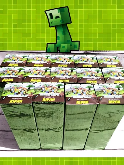 For this Minecraft party, the personalized water bottles were wrapped in green foil paper with a custom "with love from Ripan" sticker.