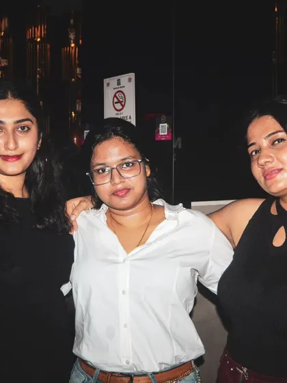 A group of friends enjoying their night out at one of my events. My music brings people together for a shared experience.