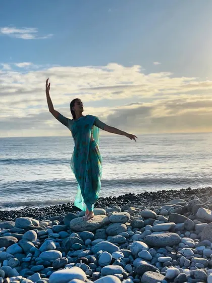 Dance is my happiness. A spontaneous pose on the shores of Reunion Island, feeling the rhythm of the waves and the joy of movement.