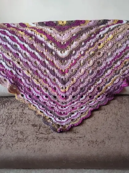 Here is the full Virus Shawl laid out, displaying its complete triangular shape and the beautiful, flowing pattern. It’s a statement piece that is both elegant and cozy.