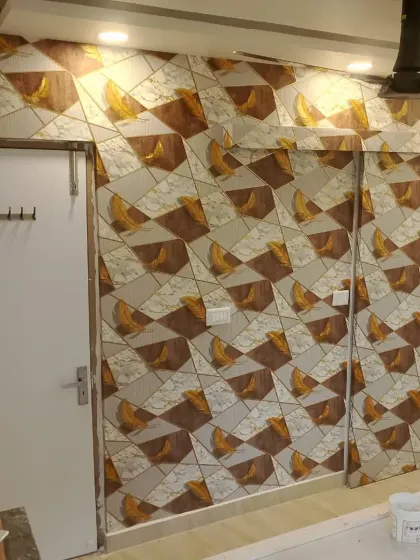 A dynamic geometric wallpaper with a mix of marble, wood, and gold textures.