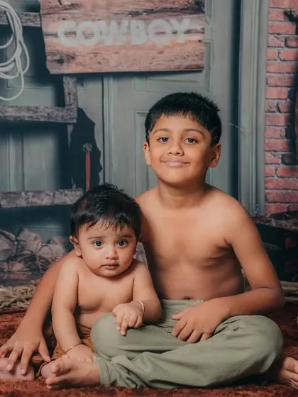 Another great shot of these two brothers, showing their strong bond and playful spirit.