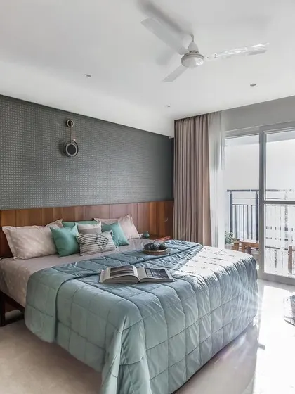 The final bedroom space, filled with natural light and featuring the exact material and color choices planned in the conceptual phase.