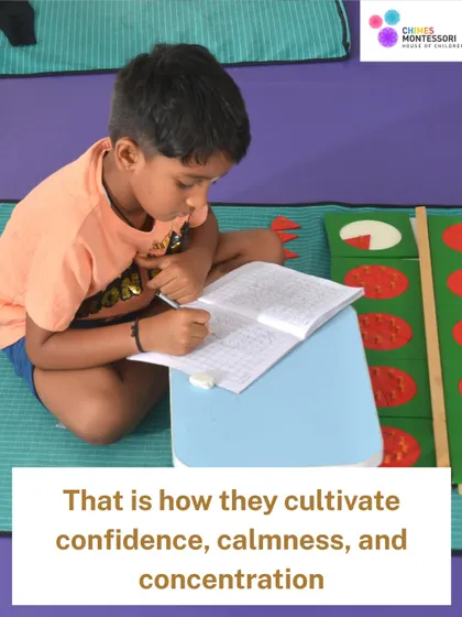 Through focused work, children cultivate confidence, calmness, and concentration. This child is deeply engaged in his math work, a testament to the power of our environment.