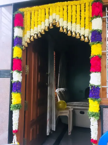 A similar style of door decoration with a different color combination. I use fresh, high-quality flowers like marigolds, roses, and chrysanthemums for all my garlands.
