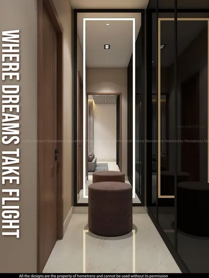 A hallway leading into a bedroom, featuring a full-length, back-lit mirror and a wardrobe with dark glass doors. This design is perfect for a kid's or guest bedroom.