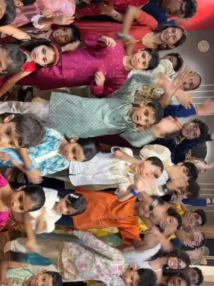 A top-down view of our junior students celebrating Garba. Their energy and enthusiasm filled the entire studio.