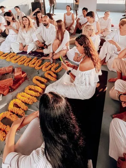 A beautiful, high-angle shot of our opening ceremony in Kerala, with marigold garlands laid out to form a sacred pattern, ready for the start of the training.
