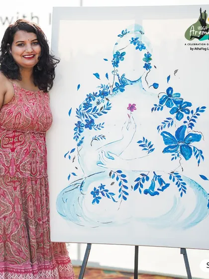 Art is an integral part of our celebrations. Here, an artist stands beside her beautiful live painting created during Yoga Arambha 2024, capturing the serene and spiritual essence of the event.