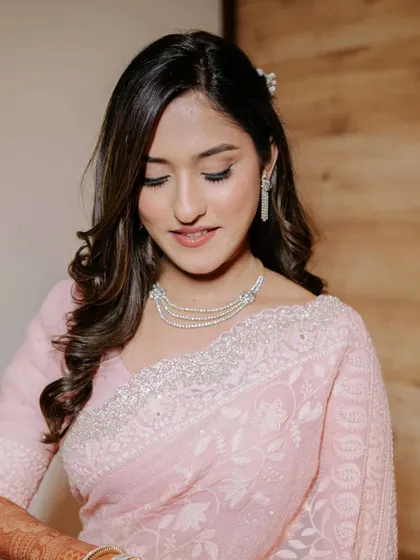 A beautiful portrait of the bride-to-be. The soft glam makeup enhances her features beautifully, creating a timeless and elegant look.