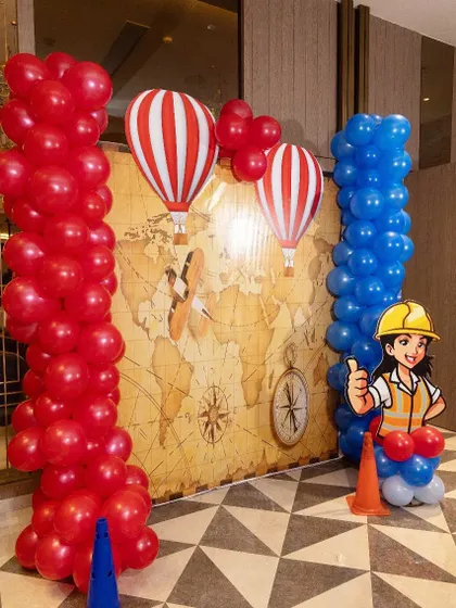 Another corner of the travel-themed party, featuring hot air balloons and a construction zone, showing the variety of elements we can incorporate.