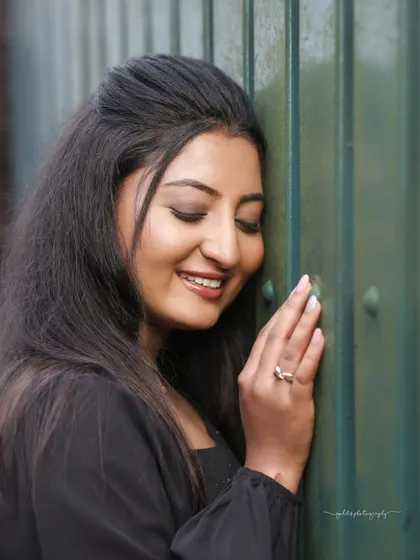 Studio and outdoor portraits of a model in a simple yet elegant black dress. This series focuses on capturing genuine expressions and personality, from joyful laughter to quiet contemplation.