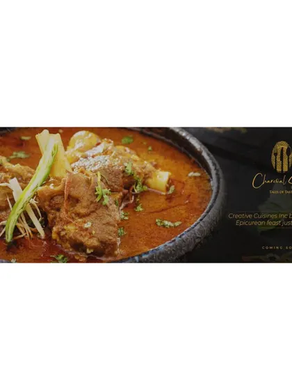 A promotional image for 'The Charcoal Story', showcasing our expertly prepared North Indian cuisine. This dish is an example of the epicurean feast we are bringing to homes, combining traditional recipes with our signature quality.