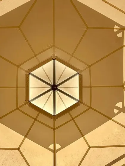 The central oculus of the dome, a point of geometric and structural convergence.