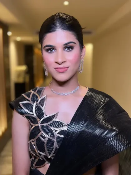 A direct look, showing the fresh, dewy makeup. This style is perfect for a cocktail party where you want to look glamorous yet feel light and comfortable.