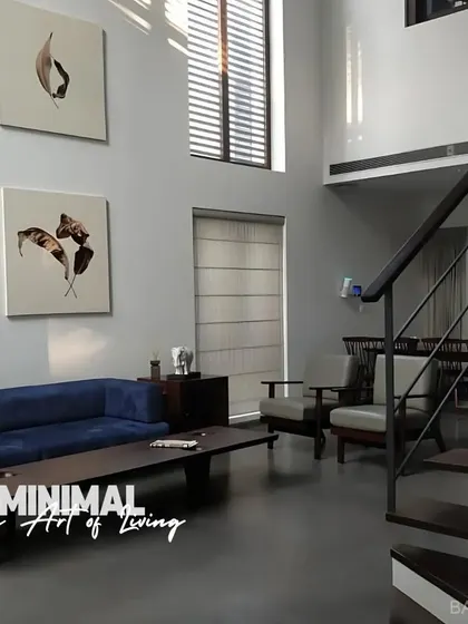 This double-height living room is an example of our minimalist design approach. We focused on clean lines, natural light, and a calm color palette to create a space that feels both spacious and serene.