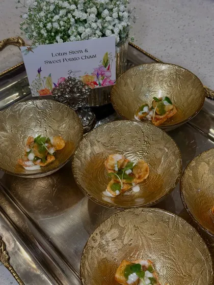 Lotus Stem & Sweet Potato Chaat, a modern take on a traditional street food, served in ornate golden bowls.
