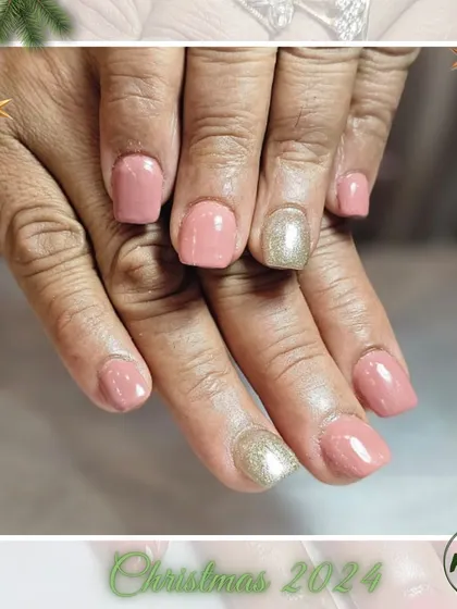 A simple and elegant holiday manicure. The combination of a dusty rose color with a single gold accent nail is chic and understated.