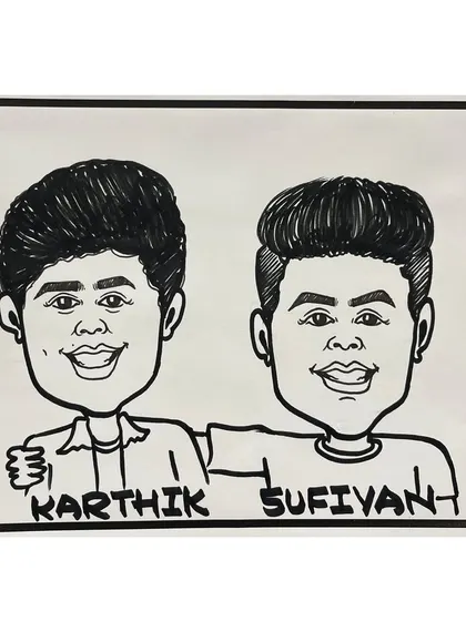 A caricature of two young friends, Karthik and Sufiyan, from an event at Universal School, Mumbai. It's a great memento of their friendship.