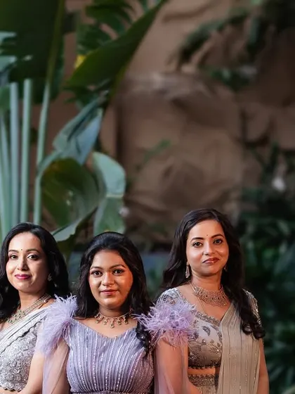 A gallery celebrating family bonds through fashion. These images feature more moments of mothers, sons, sisters, and other family members dressed in beautifully coordinated custom outfits for their most important events.