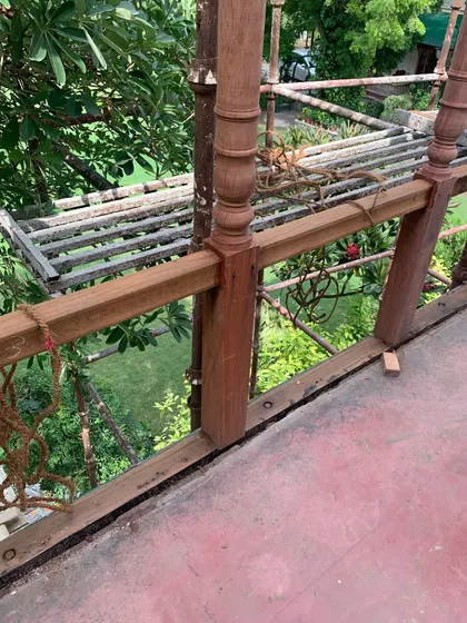 The same detail shot, capturing the craftsmanship involved in recreating and repairing the traditional wooden elements.