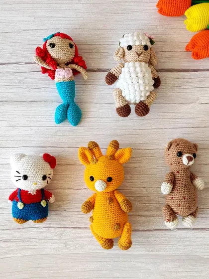 The whole family of crochet creatures together. You can order them individually or as a set for a themed nursery.