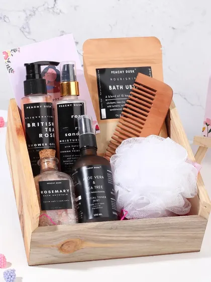 A closer look at the bath and body themed Mother's Day hamper, featuring bath ubtan, shower gel, and a loofah for a complete spa-at-home experience.