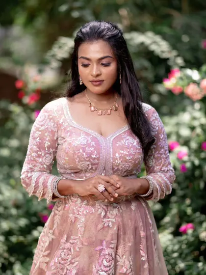 Another shot from the "art of subtle" series. The model looks serene and beautiful in her pink lehenga, with makeup that is soft and elegant.