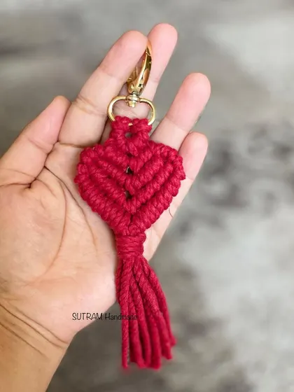 A perfect Valentine's gift! This bright red, heart-shaped macrame keychain is a simple and sweet way to show your love.
