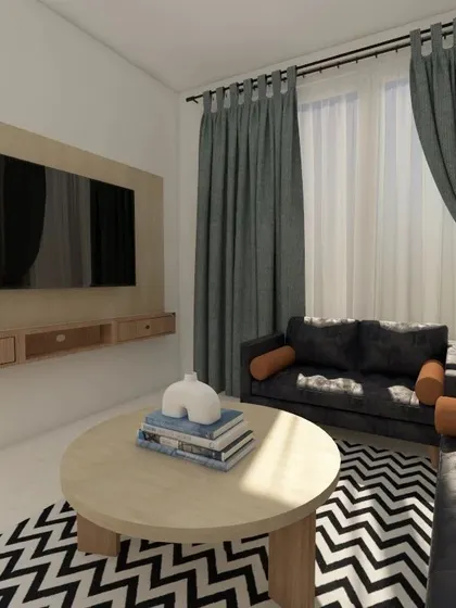 The TV unit in this living room is designed to be simple and functional, with a light wood finish that matches the overall Scandinavian aesthetic.
