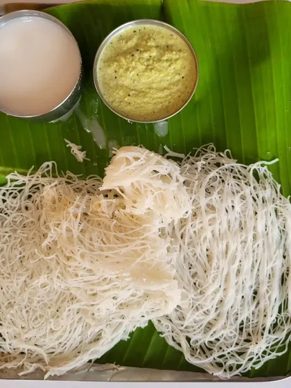Our Idiyappam, or string hoppers, are delicate rice noodles served with fresh coconut milk and chutney. It's a light, healthy, and traditional breakfast option.