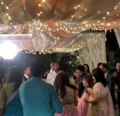 A candid shot of the guests enjoying the celebration.