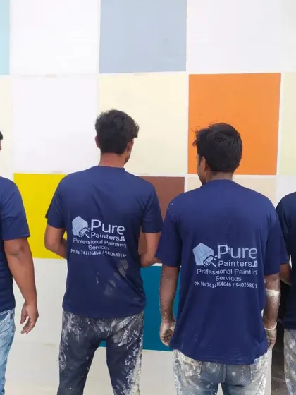 Our team of Trained Professionals in uniform, showcasing our commitment to organized and reliable service on every decorative painting project.