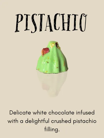 The Pistachio modak is made with delicate white chocolate infused with a crushed pistachio filling, offering a nutty and creamy flavor.