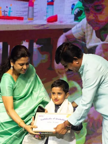 A graduate receives his certificate from our chief guest during the graduation ceremony.