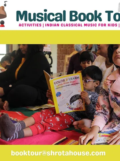A young boy is completely engrossed in his "Color & Learn" book during a live performance. Our book is designed to be a multi-sensory learning tool.