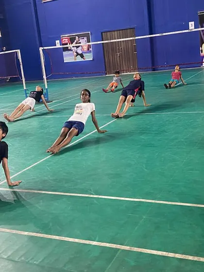 This stretching exercise is part of our yoga routine to improve core strength and flexibility. A flexible body is less prone to injury and allows for a greater range of motion in shots.