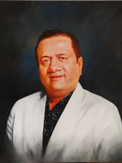 This is the final oil on canvas portrait I created for Mr. Dinesh Lakhani, the Global Director of Kiran Gems. It showcases my ability to deliver professional, formal portraits for corporate leaders, capturing a sense of presence and accomplishment.