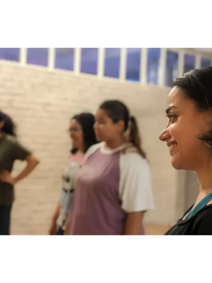 A smile of contentment and focus. We create an environment where students feel comfortable and inspired to explore their movement potential.
