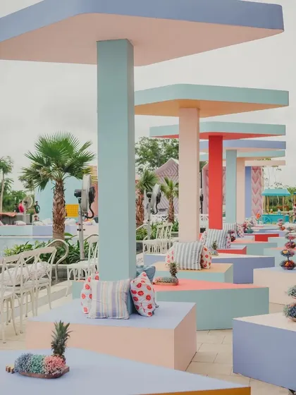 Original is sexy, and that means daring to be different. For this day brunch, we moved away from typical wedding decor and created a vibrant, playful atmosphere with custom-built geometric canopies and seating in a fresh, happy color palette.