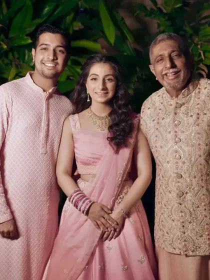 The bride with her father and brother, a cherished family photograph.