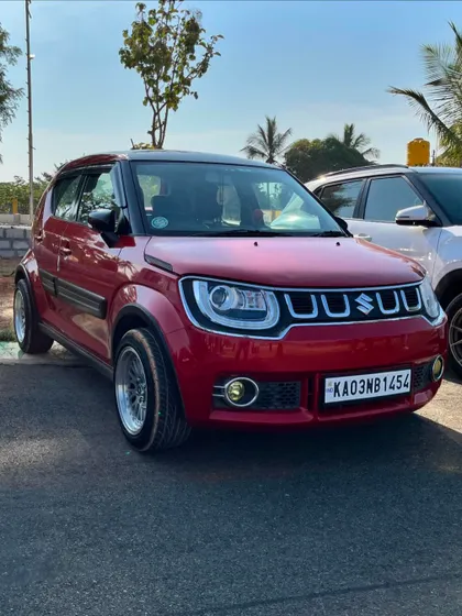 A modified red Suzuki Ignis looking sharp at the meetup. We welcome all types of cars, from stock to fully customized.
