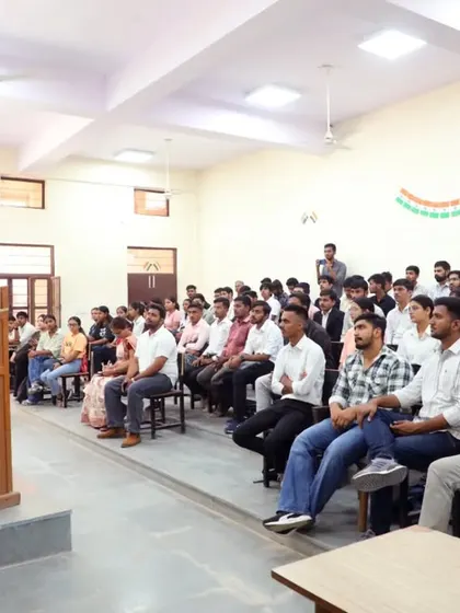 A wide view of the lecture hall at JNVU, filled with students eager to learn about the legal profession.