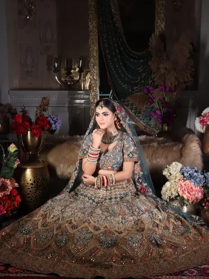 A stunning wide shot that captures the entire bridal ensemble in a beautifully styled setting, perfect for a portfolio.